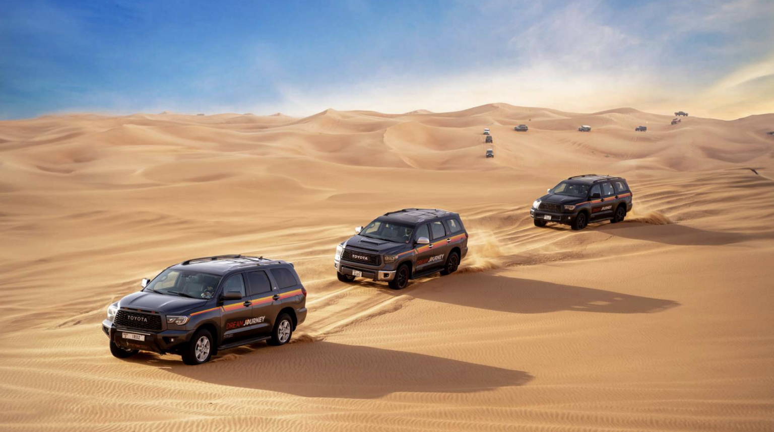 Dubai Desert Discovery: Red Dunes Safari, Sandboard & Camel Ride